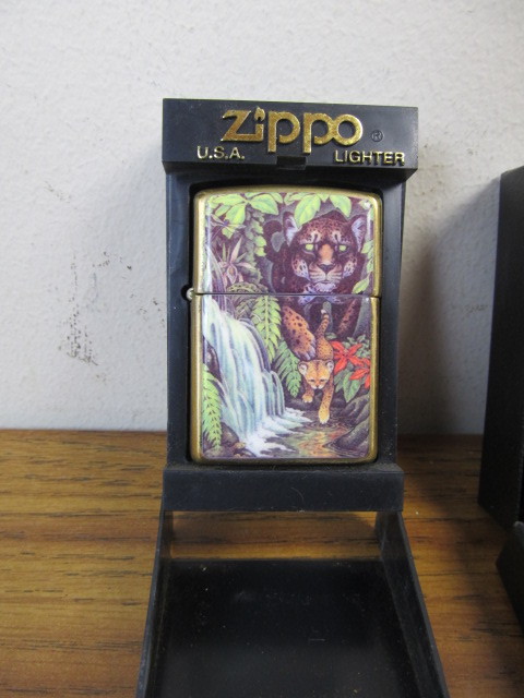 lot 159 image: Group of 4 Assorted Zippo Lighters 