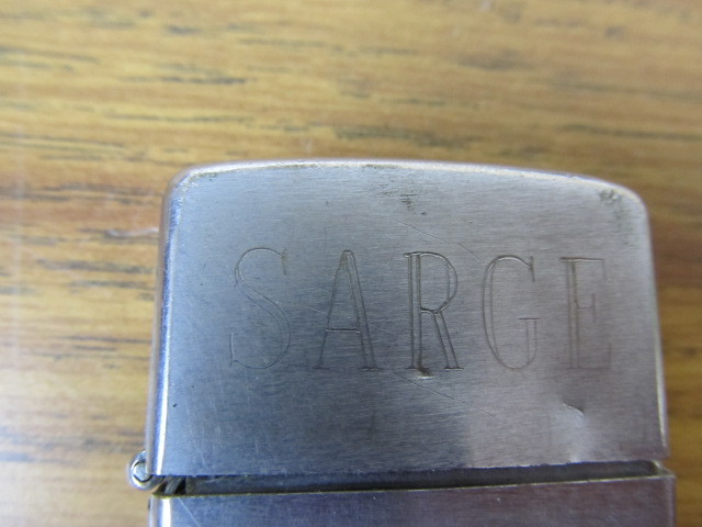lot 162 image: Vintage 1973 Vietnam War Era Engraved Zippo Lighter
