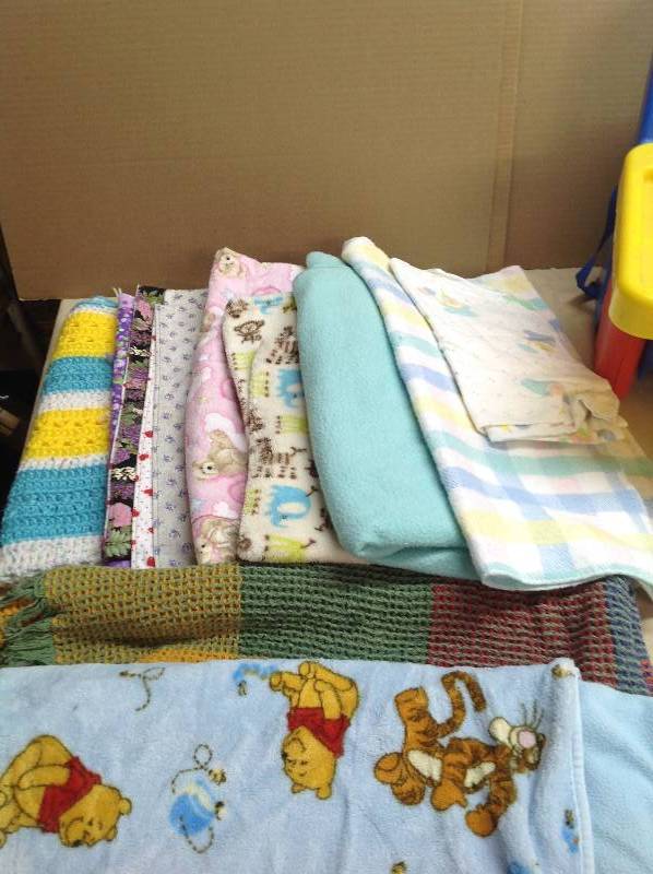 17 Baby Blankets and a high Chair and a Baby Sit Up Supporter
