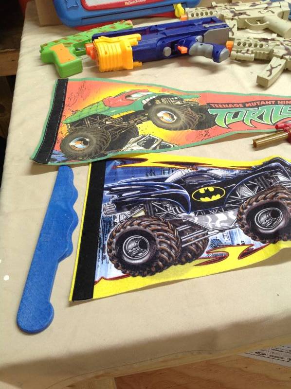 Lot of Kid toys, Squirt Guns, Ninja Turtle Ball, Batman and Ninja Turtle Flags, and toy guns
