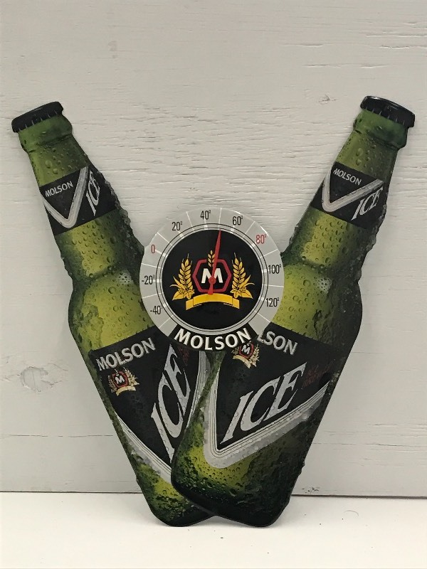 lot 107 image: Molson Ice Tin Beer Sign With Clock...