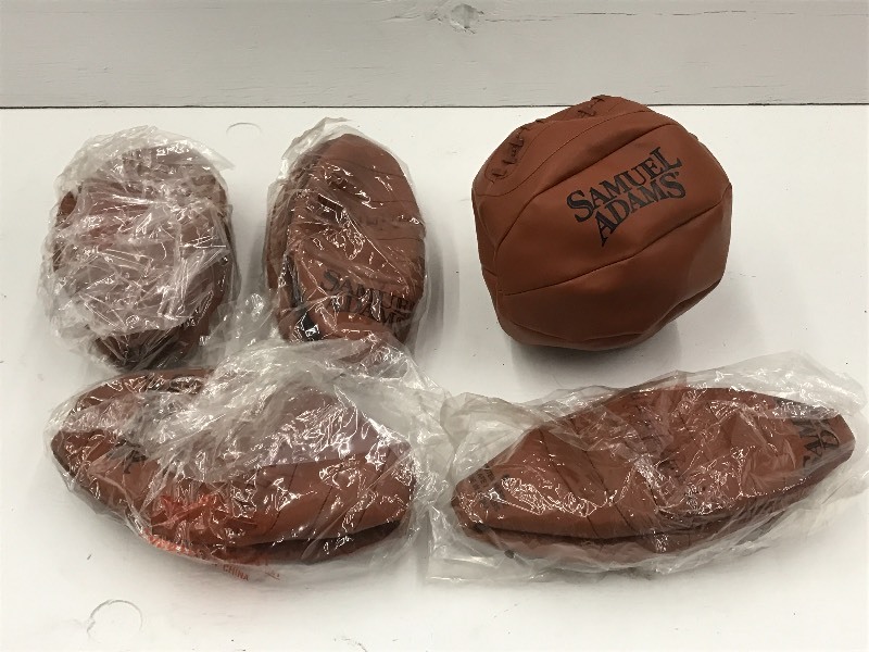 lot 131 image: (5) Samuel Adams Inflatible Footbal...