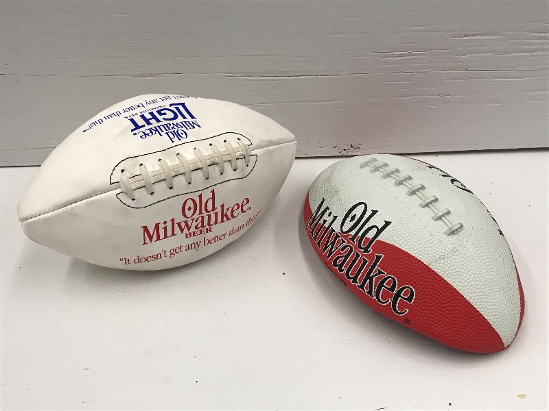 lot 132 image: (2) Old Milwaukee Footballs ...
