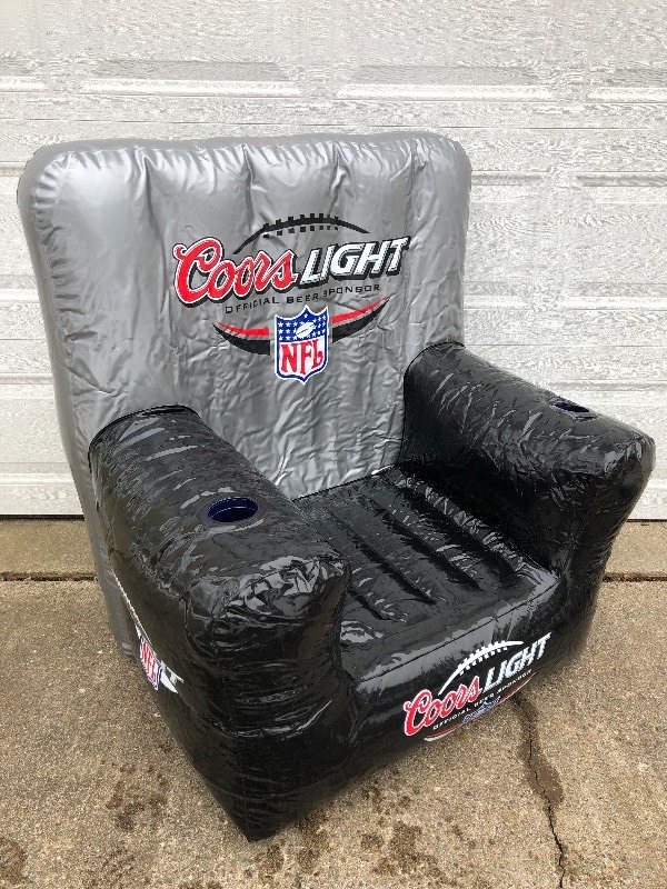 lot 139 image: Coors Light NFL Inflatible Recliner...