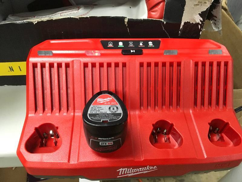 Milwaukee M12  Four Bay Sequental Charger Batteries Not Inculded in like new condition