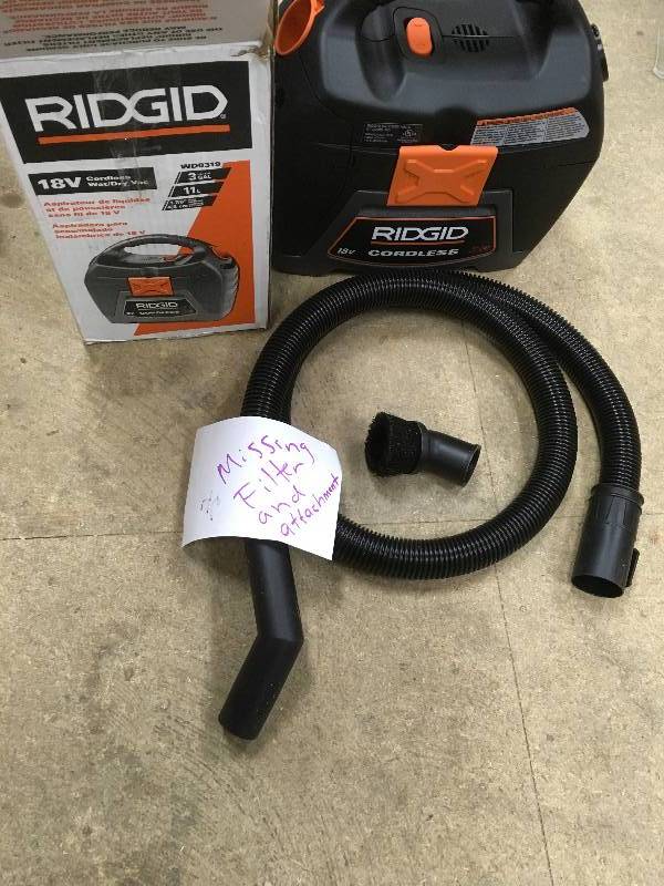 lot 71 image: Ridgid 18-Volt Cordless 3 Gal WetDry Vac Missing Filter and one Attachment not used