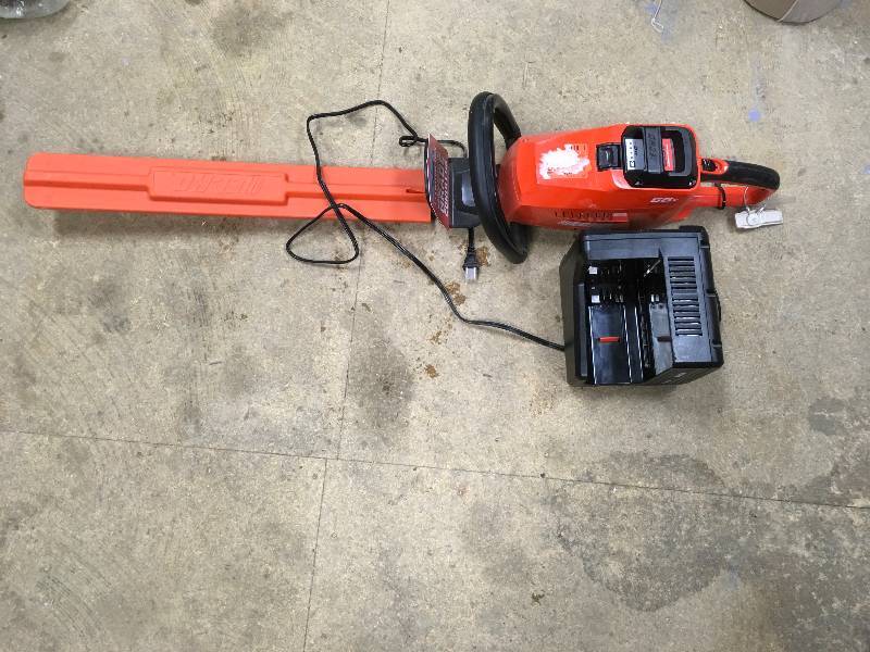 lot 73 image: Echo 58 Volt Lithium-Ion Cordless Hedge Trimmer- 2.0 Ah Battery and Charger Inculded not used
