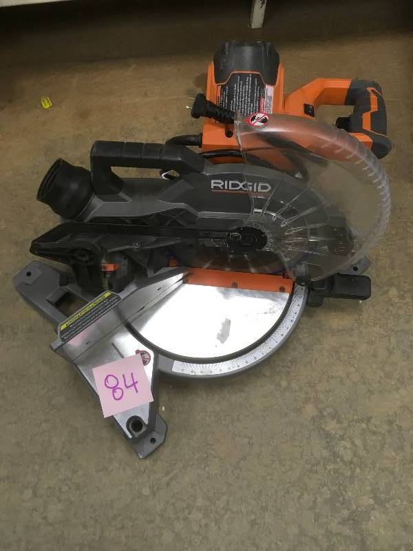 lot 84 image: Ridgid 15 Amp 10 in. Dual Bevel Miter Saw with Laser used in working condition