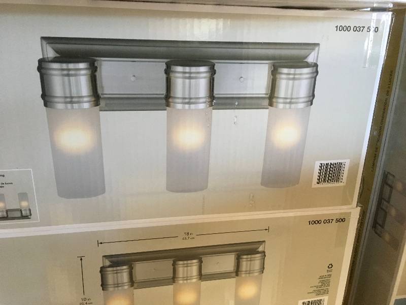 lot 91 image: Hampton Bay Charenton 3 - Light Vanity Fixture, Brushed Nickel Finish - Frosted Glass Shades not used