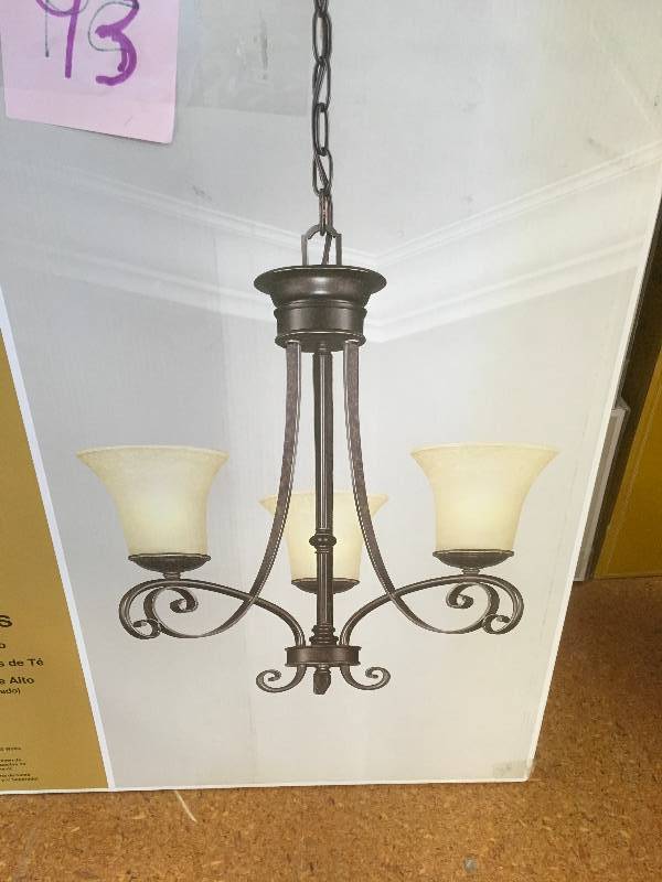 lot 93 image: Hampton Bay Essex 3 Light Chandelier- Aged Black Finish with Tea Stained Glass Shades not used
