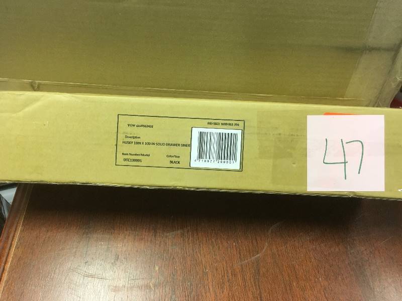 lot 47 image: Husky 18 in. x 100 in. Premium Drawe Liner, Black not used