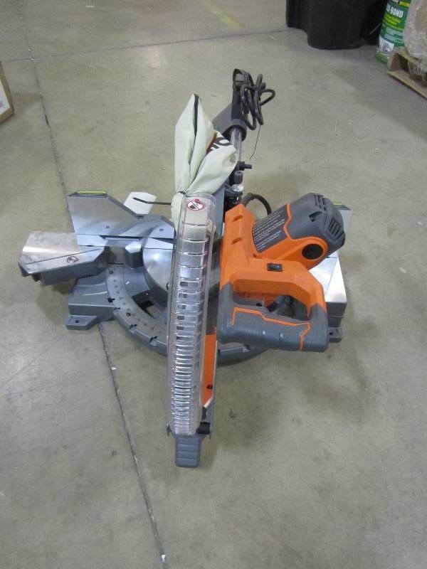 lot 105 image: RIDGID 15 Amp 12 in. Corded Dual Bevel Sliding Miter Saw with 70 Degree Miter Capacity