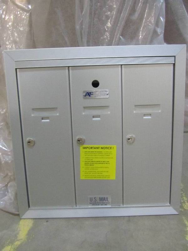 lot 147 image: Salsbury Industries Aluminum Surface-Mounted USPS Access Vertical Mailbox with 3 Door