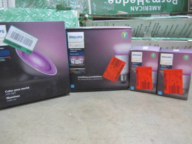 lot 194 image: Philips Hue Bloom White and Color Ambiance Smart Light, Hub RequiredHue 60W Equivalent White and Color Ambiance A19 Starter Kit (4-Pack)Hue White and Color Ambiance A19 60W Equivalent Dimmable LED Smart Bulb(x2)
