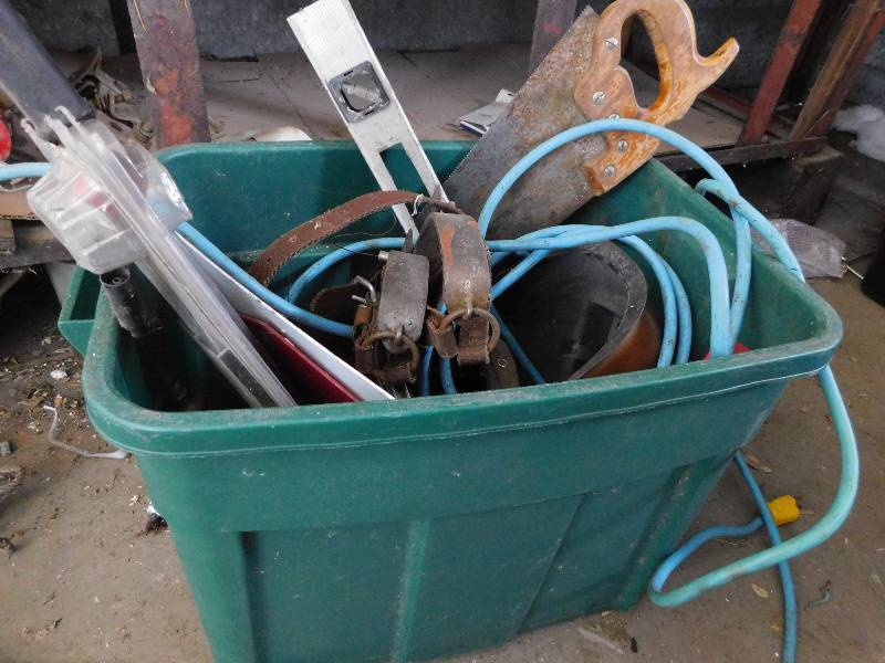 lot 41 image: TOTE WITH MISC GARAGE ITEMS, EXTENSION CORD AND TOOLS
