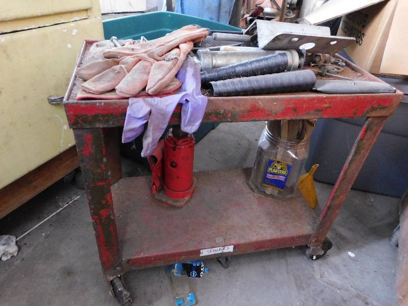 lot 54 image: SMALL METAL CART, INCLUDES CONTENTS, BOTTLE JACK