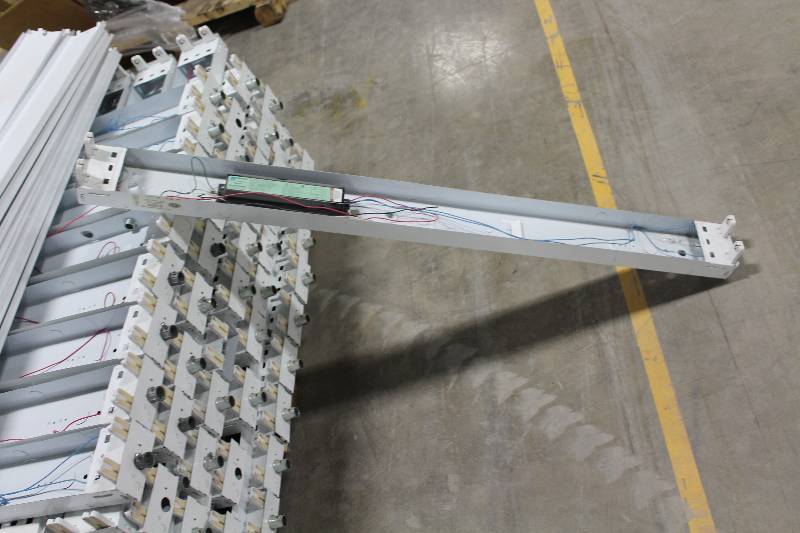 lot 65 image: Lot of (10) Magnetek Triad 4ft. Shop Light Electronic Ballasts