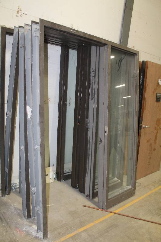 lot 123 image: Single Metal Door Frames w Full Length Glass Side Panels