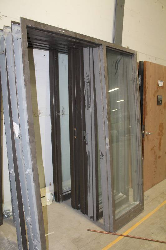lot 124 image: Single Metal Door Frames w Full Length Glass Side Panels