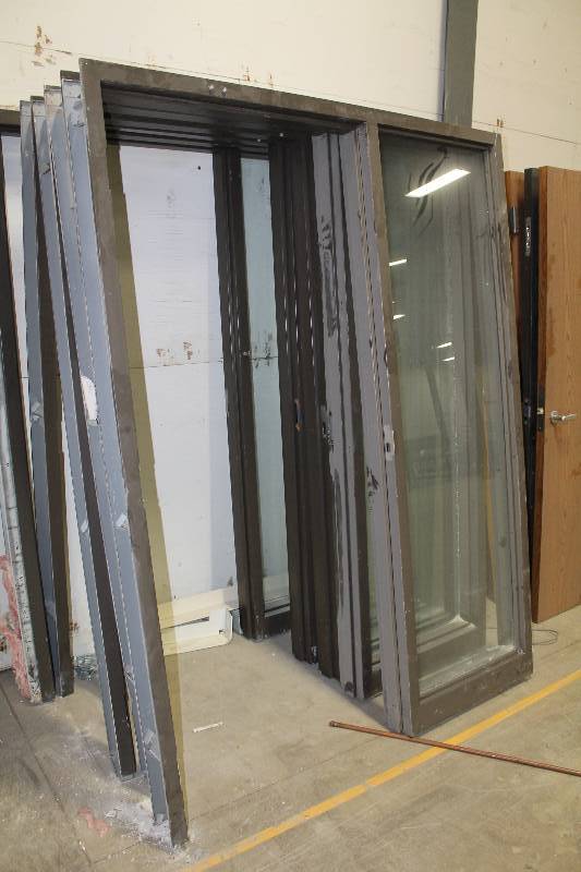 lot 125 image: Single Metal Door Frames w Full Length Glass Side Panels