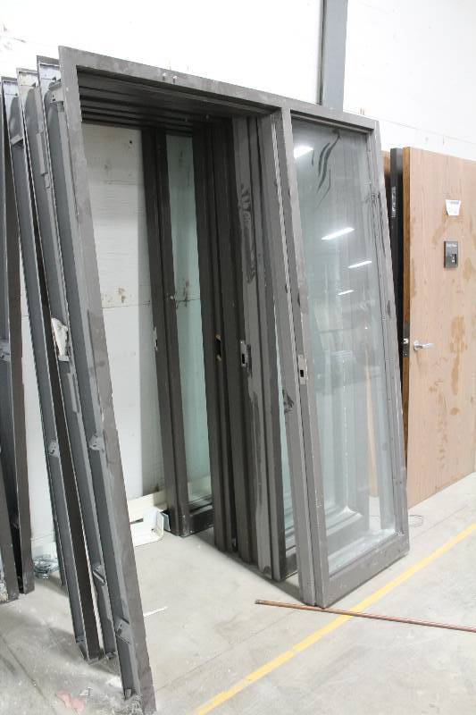 lot 127 image: Single Metal Door Frames w Full Length Glass Side Panels