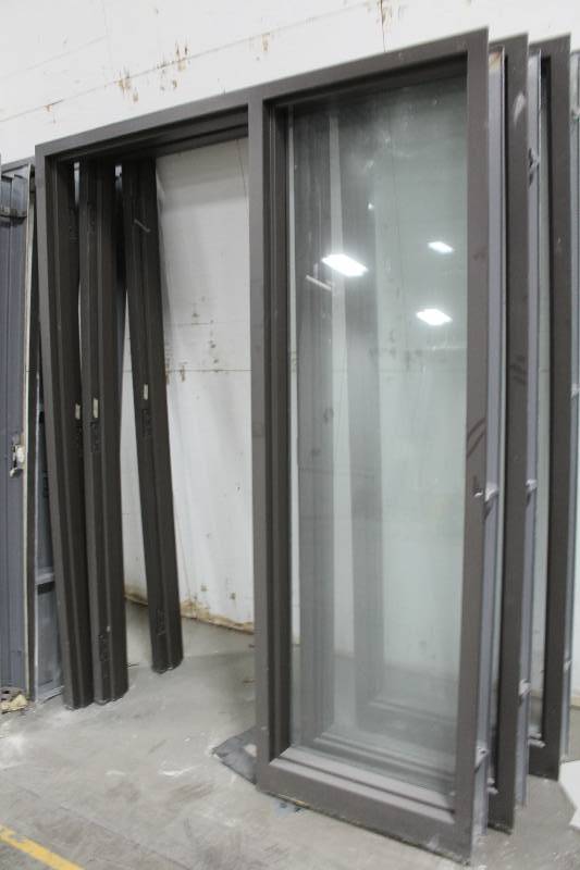 lot 130 image: Single Metal Door Frames w Full Length Glass Side Panels