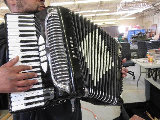 lot 701 image: PETOSA ACCORDION IN HARD TRAVEL CASE
