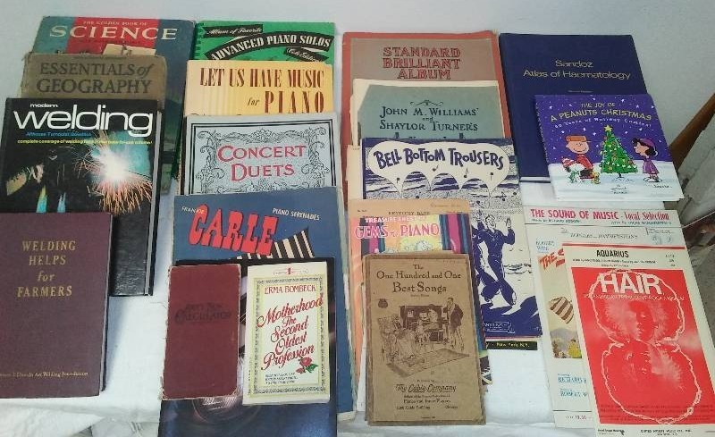 lot 9 image: Books, Science, Welding, Geography, Music, Harley-Davidson