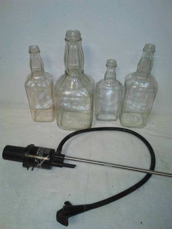 lot 79 image: Beer Tap for Keg and Jack Daniels Vintage Bottle