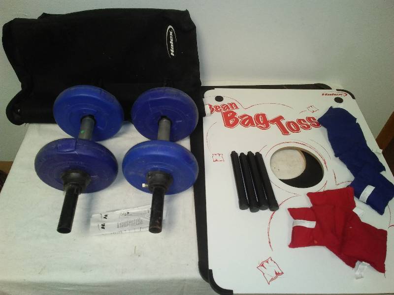 lot 91 image: Dumbbell Weights, cornhole game, Halex Bean Toss  New in travel bag