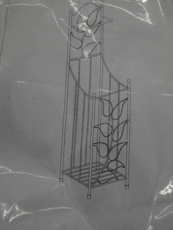 lot 34 image: Ivory Leaf TP Holder, open box...