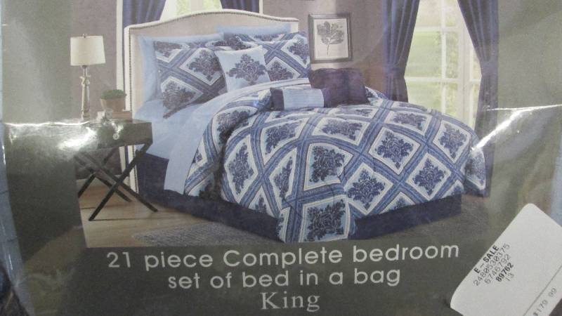 lot 95 image: 21 Piece King Bed Set open pkg Reta...