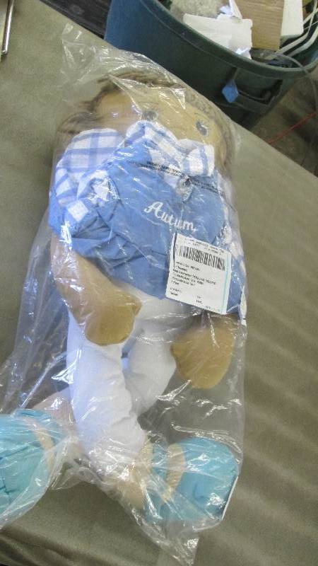 lot 231 image: Large Soft Doll with Pre-personaliz...