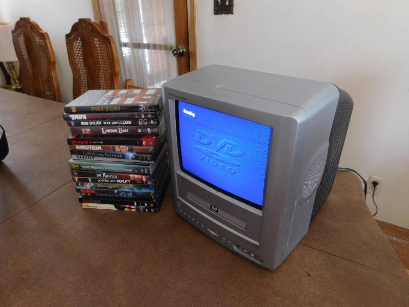 lot 15 image: Toshiba DVD Player with DVDs