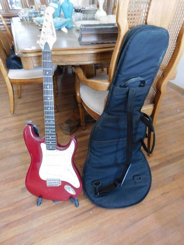 lot 127 image: Electric Guitar with Stand & Case
