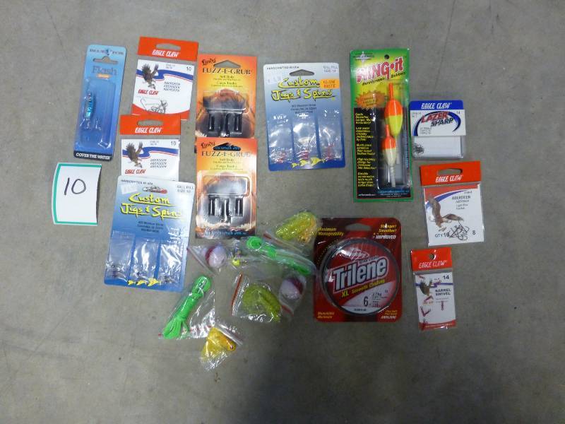 lot of fishing jigs, hooks, line, s...