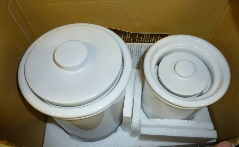 4 Stoneware canisters new damaged b...