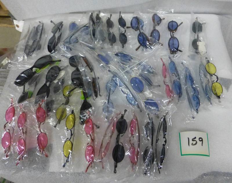 50 pair of sunglasses various color...