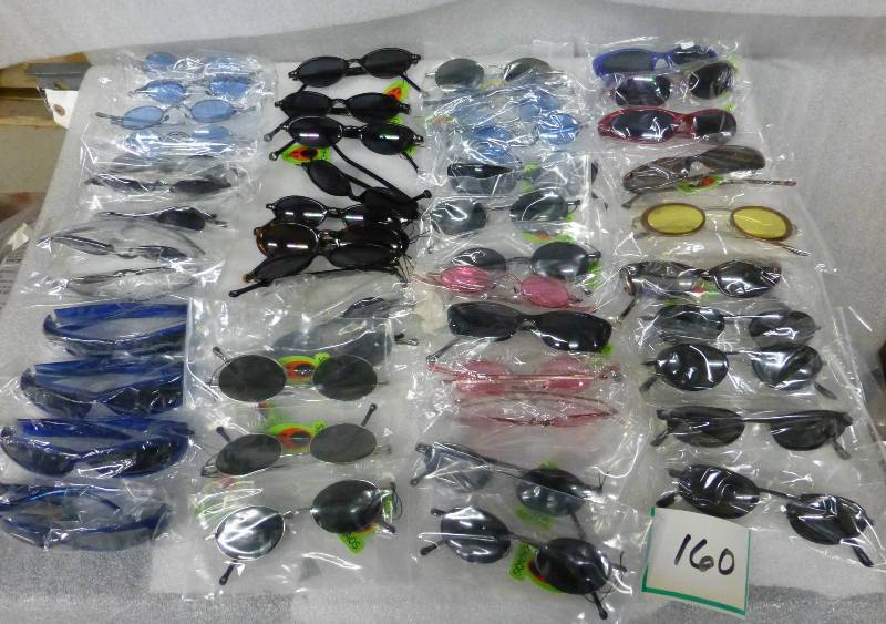 50 pair of sunglasses various color...