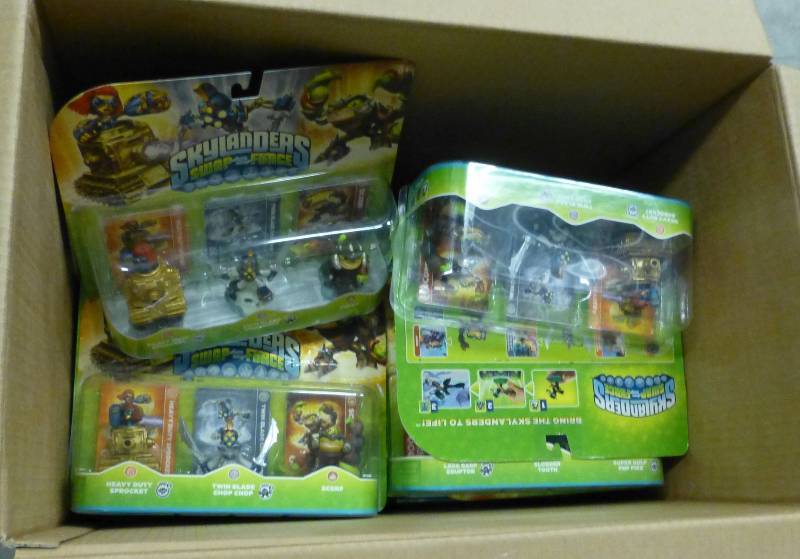 23 sets of 3 skylander toys ...