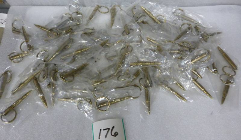 about 75 bullet keychains...