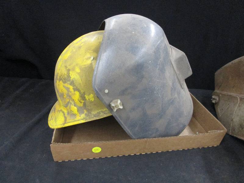 lot 28 image: Hardhat fastened to a Welding Helmet