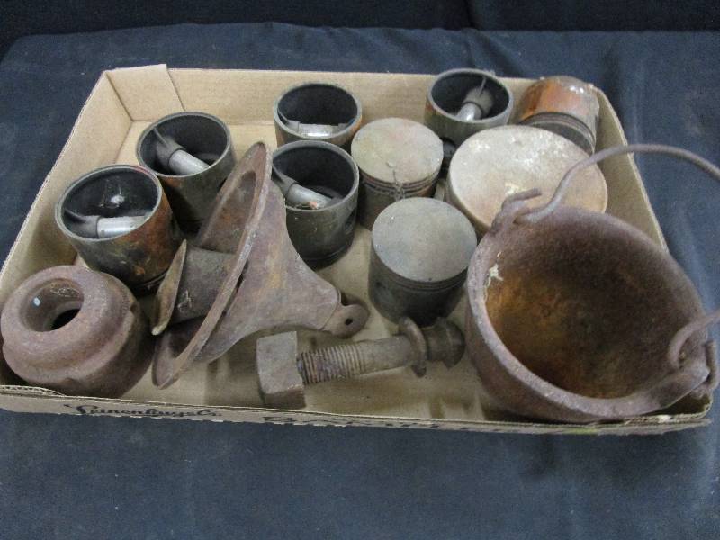 lot 35 image: Box of old Pistons and lead Melting Pot