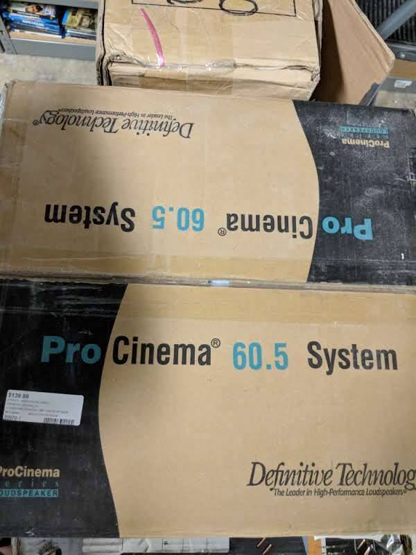 lot 50 image: Pro Cinema 60.5 System - 4 Surround Sound Speakers one center speaker