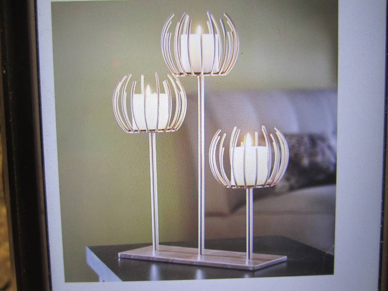 Metal Pierce Tabletop Candle Holder...