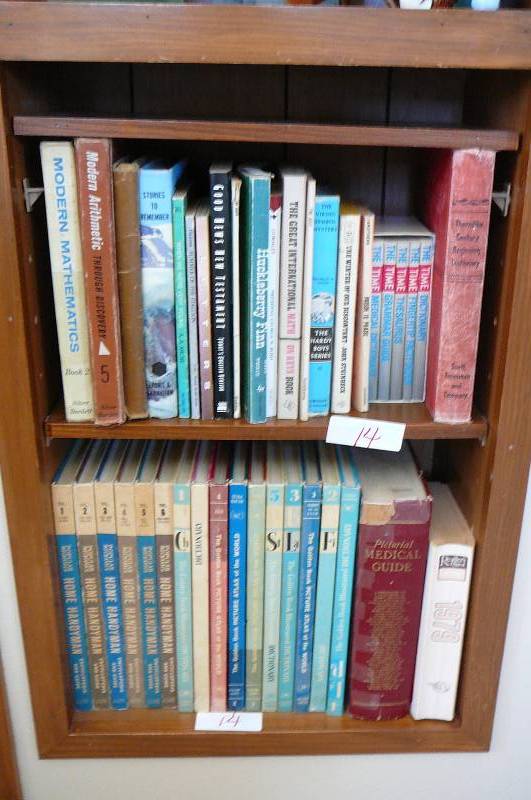 lot 14 image: Old Atlas, Popular Mechanics Homes Handy Man Books, Medical Guide
