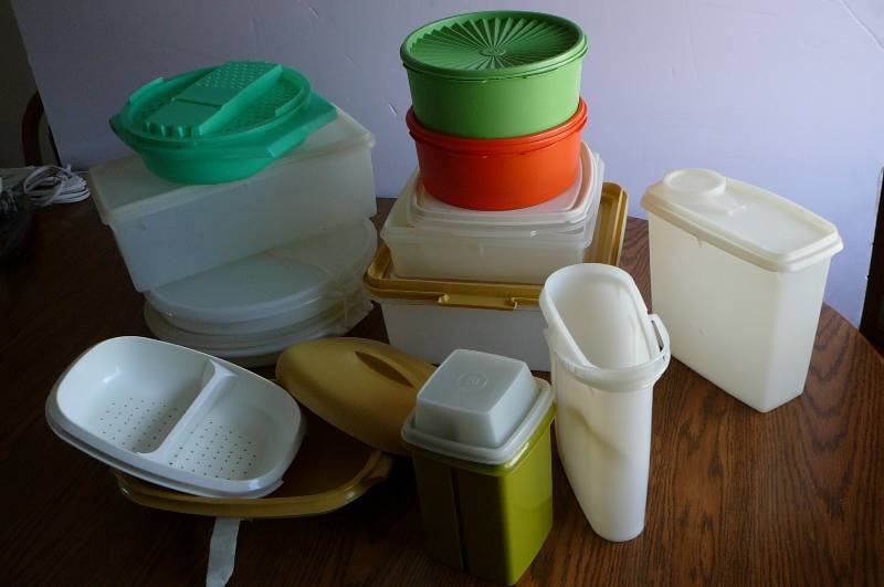 lot 67 image: Tupperware Containers With Lids, Steamer Dish, Pickle Holder, Pie Carriers, Beverage Containers, Vegetable Grater With Bowl