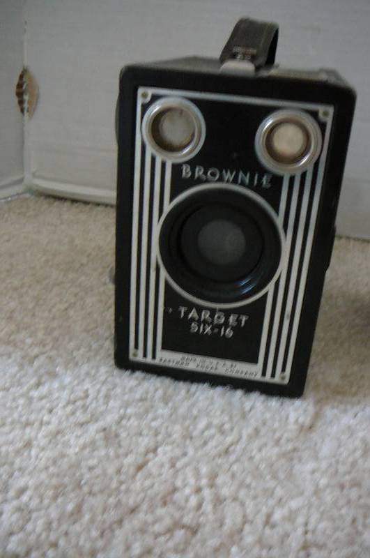 lot 74 image: Old View Master With 6 Viewing Disks of Disneyland, Brownie Target Six-16 Box Camera