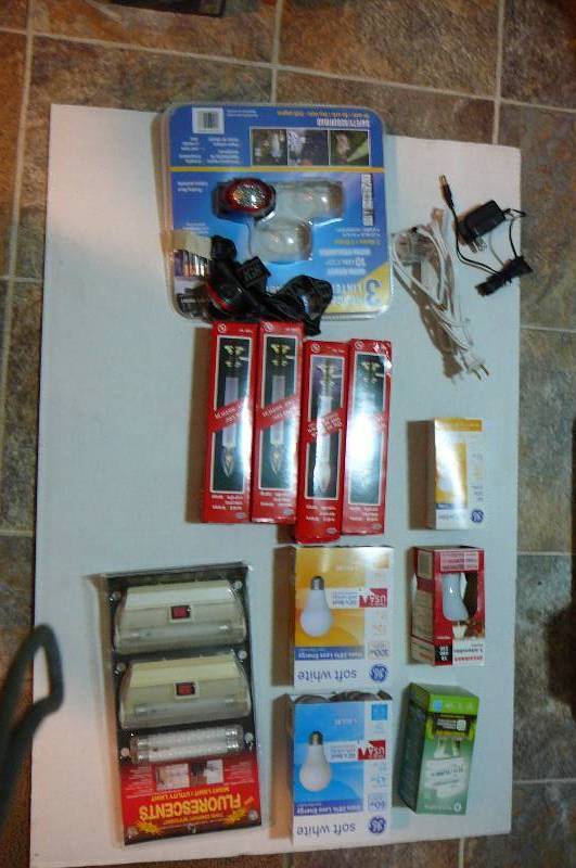 lot 123 image: Various Elec Bulbs, Headlamps, Brass Electric Candle Lamps