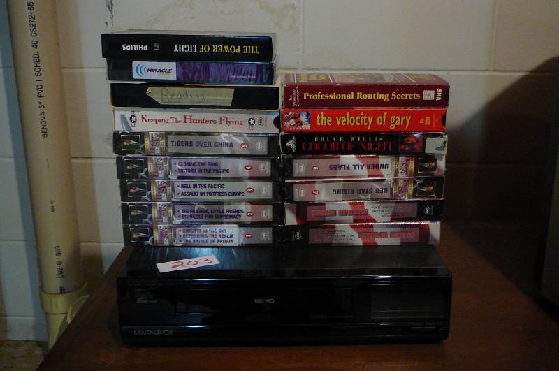 lot 203 image: Magnavox VHS HQ Tape Player-16 VHS Tapes